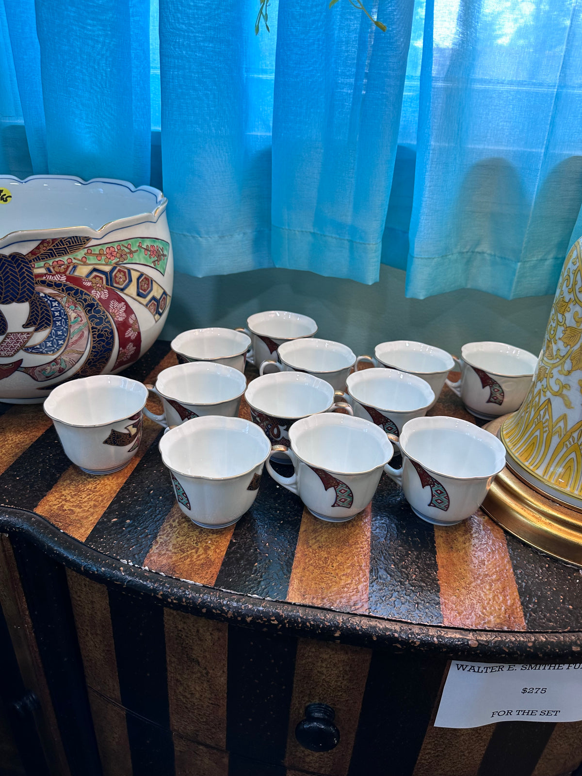 Gold Imari set 12 cups and 1 large bowl. $65 in store pick up