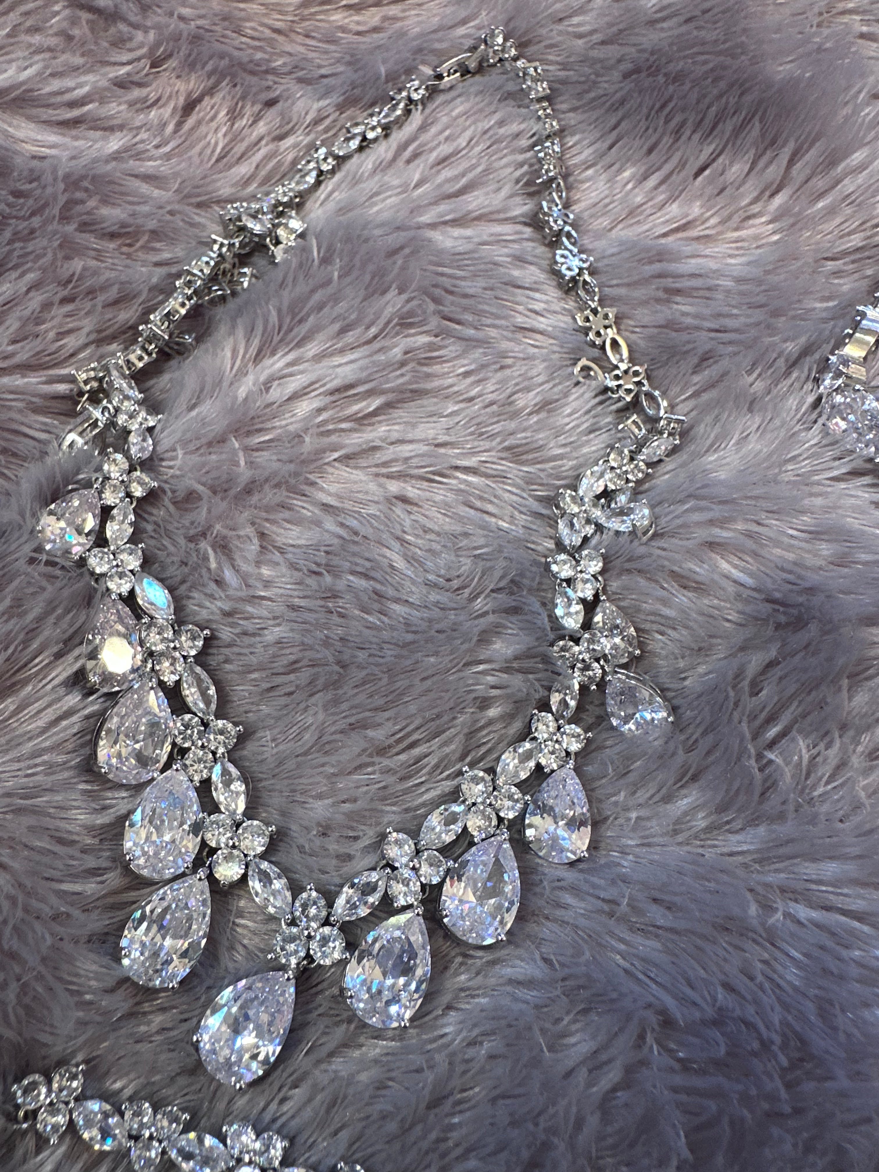 5 piece set (New) pierced earrings, 2 necklaces, bracelet and tiara crown